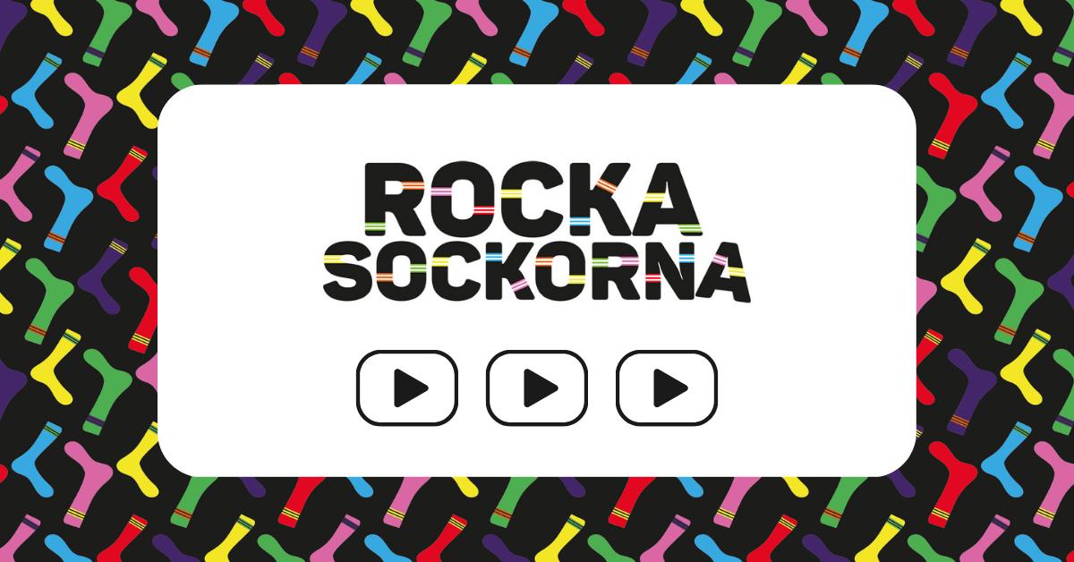 Rocka sockorna text och en bakgrund med olika färgers sockor.